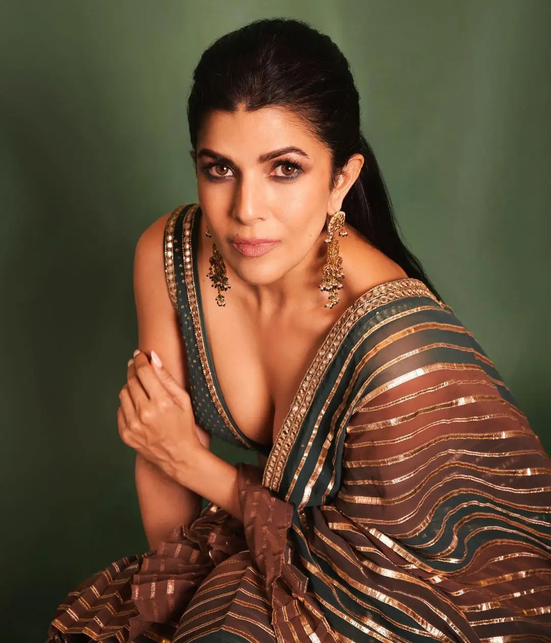 Bollywood Actress Nimrat Kaur Stills In Maroon Saree